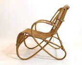 Mid century rattan lounge chair.