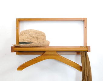 Scandinavian wall valet in pinewood from the 1960s-70s.