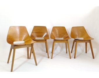 Pierre Guariche, set of 4 Tonneau chairs with wooden legs, Steiner, 1950s.