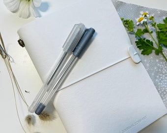 Polar White Faux Leather Wrap A5 Refillable Journal Notebook -Polar White with plain pages inserts.