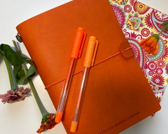 Burnt Orange Faux Leather Wrap A5 Refillable Journal Notebook -Burnt Orange with plain pages inserts.