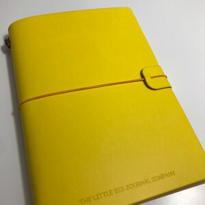 Bright Yellow Faux Leather Wrap A5 Refillable Journal Notebook bright yellow with plain pages inserts. image 2