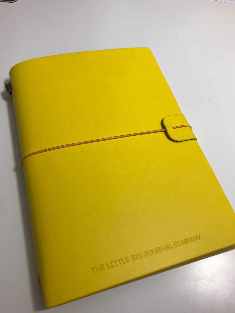 Bright Yellow Faux Leather Wrap A5 Refillable Journal Notebook bright yellow with plain pages inserts. image 2