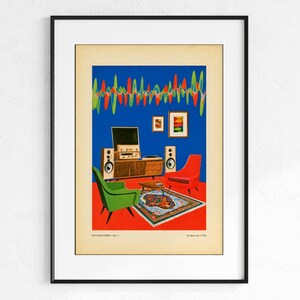 May include: A framed art print featuring a mid-century living room illustration with a blue wall, red carpet, green and red armchairs, a wooden media console with speakers, and a patterned rug. The text reads "PRESTURE STEREO v. No. 4" and "The Better Buy © 1973".