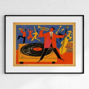May include: A framed art print titled HOT WAX BOP No. 1 featuring a stylized illustration of a jazz band with a trumpet player, a double bass player, and a large record player in the foreground, rendered in vibrant orange, blue, and black.