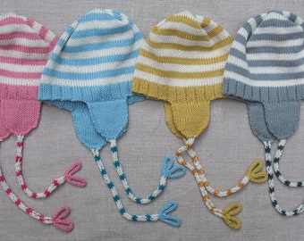 Knitted cotton baby hat. Matching 'comfort blanket'.