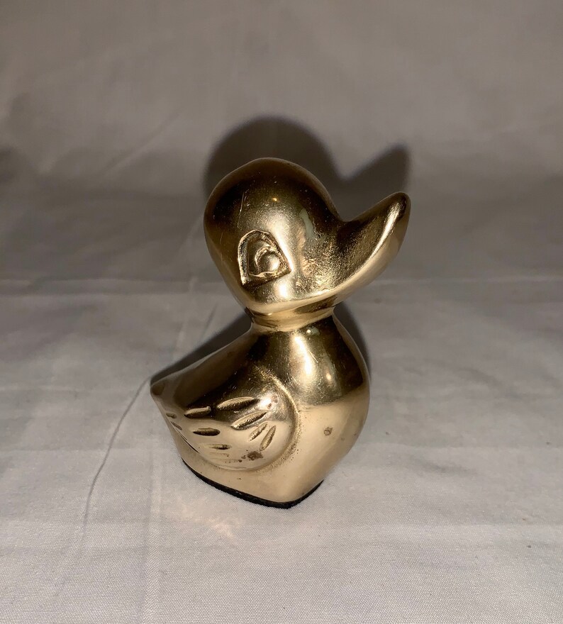 solid brass duck figurines