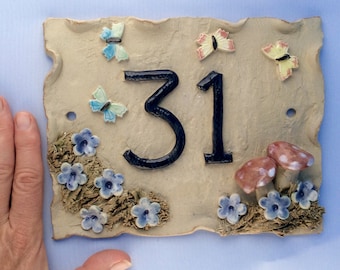 House number plaque, ceramic door numbers,  yard sign, address plaque.