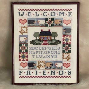 SAMPLER CROSS STITCH…”Welcome Friends”…Handmade…Framed…Hearts, Animals, House with Trees…Large Wall Art…Vintage # W.Bx 4