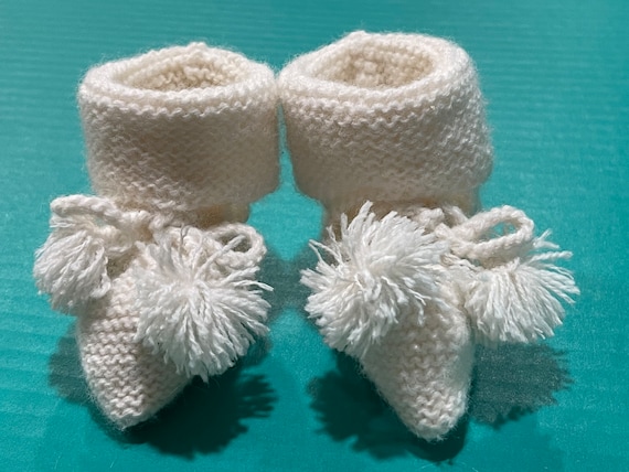 KNITTED BABY BOOTIES…Handmade…White…Pompoms…Ties…… - image 1