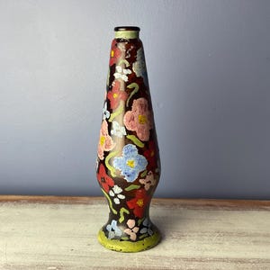 COLLECTIBLE GLASS BOTTLE…Hand Painted with Flowers and Green Designs…Collectible Bottle Turned into Art Piece…Glass…Vintage #W.T.1