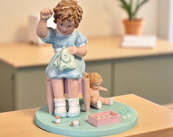 LITTLE MOTHER FIGURINE…Bessie Pease Gutmann…The Danbury Mint…Little Girl Mothering Her Doll…Resin…1993 #W.T5