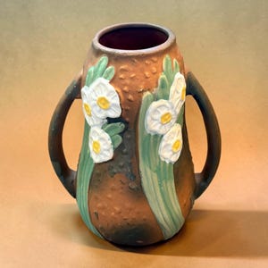 ROSEVILLE VASE…8”…Raised Jonquil Flowers and Leaf Design…Textured Body…Tall with Dual- Handles…528-8…Green, Brown and White…1930s