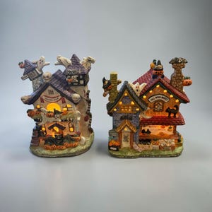 SMALL HAUNTED HOUSES…Illuminated…Set of 2…”Full Moon Market” and “Haunted House”… Lighted Porcelain… “Haunted Haven Halloween Village” 1994