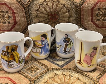 NORMAN ROCKWELL MUGS…Four-Piece Coffee Cup Set…Gold Rim and Handle Design…Kitchen Drink-ware Set…J.S.N.Y…White with Print…Taiwan…1980s #W.U.