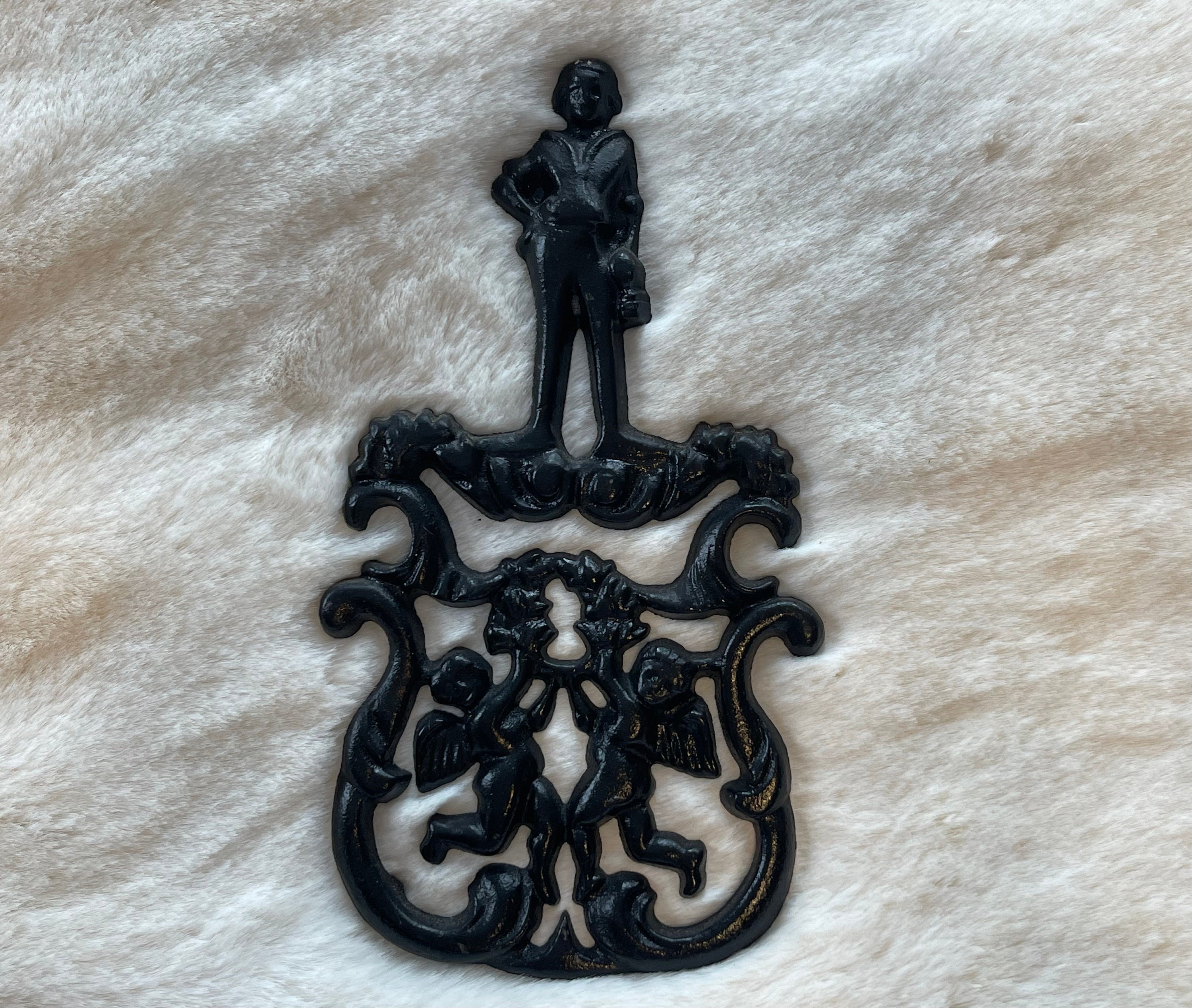 CAST IRON Trivet…cupid Motif…cherubs Holding a Wreath CAST IRON Trivet…cupid Motif…cherubs Holding a Wreath