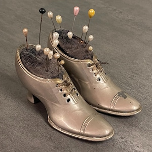 ANTIQUE VICTORIAN PINCUSHIONS…Set of 2…Silver Tone…Sawdust Filled Fabric…Original Laces…Miniature Heels…1800s #W.T.1