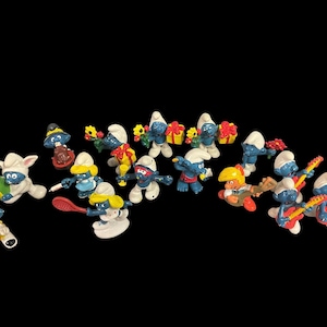 SMURF FIGURES With PEEWIT…Smurf Lot of 15 figures…Smurf, Smurfette,  Papa Smurf.…2” - 2 1/4”…Repeats…Schleigh H.K. 1970s-Early 1980s #940s-3