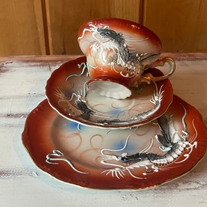 DRAGONWARE TEA SET…Moriage…Orange Edging…Dragons Span Across the Pieces…Teacup, Saucer and Plate…Gold Handle and Accents…1920-1940 #000Bx2