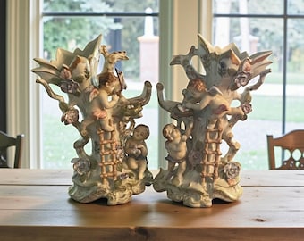 PORCELAIN CHERUB VASES…Ucagco…Set Of 2…Ladders, Birds, Nests…Flowers…Intricate Designs…1950s…Rare!