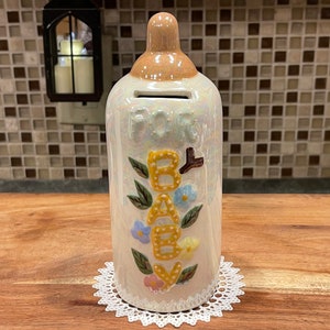 BABY BOTTLE BANK…”For Baby”…Opalescent Rainbow Hues…Saving Bank…Front Change Slot…Rubber Stopper…Vintage #798