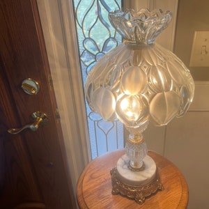 CRYSTAL GLOBE LAMP…Clear and Frosted Teardrop Design…Scalloped Top…Clear Pedestal…Round Marble Base…Metal…2 Candle Bulbs…Vintage #000
