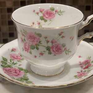 PINK ROSE TEASET…Avon…Pink Rose Sprays…Fine Bone China…Ornate Handle…Gold Rims…Scalloped Plate…Floral Tea Set…England…1974 #950