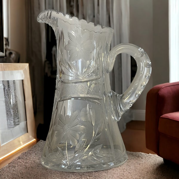 CRYSTAL CUTGLASS PITCHER…Antique…Etched Flowers…Scalloped Edge…Notched…Starburst Bottom…Glass Handle…Heavyweight…American Brilliant…1900s