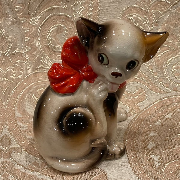 CAT FIGURINE…Nippon…Licking Paw…Big Red Bow…Cat Collectible…Unusual Cat Figurine…Kitsch…Knick Knack…Glazed…1950s Japan #645