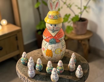 RABBIT NESTING DOLL…12-Piece Set…Oriental Trading…Wooden…2-Piece Rabbit… Hand Painted Floral Bonnet, Carrots…10 Small Bunnies…1990s #906