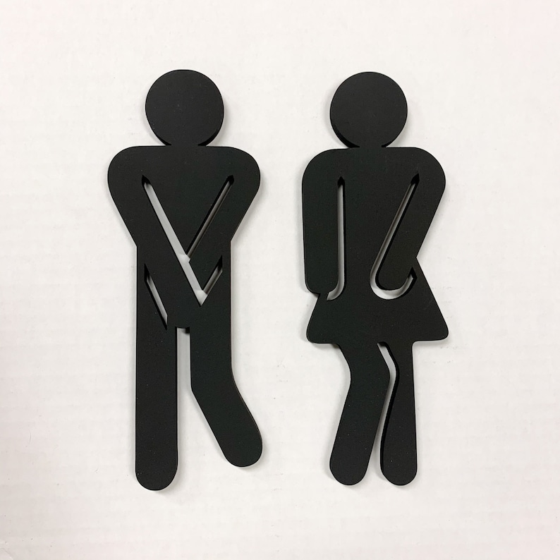 K&ouml;nnte beinhalten: Schwarze Silhouette einer Person mit verschr&auml;nkten Armen und eine schwarze Silhouette einer Person mit verschr&auml;nkten Armen und einem Rock. Die Silhouetten befinden sich auf einem wei&szlig;en Hintergrund.