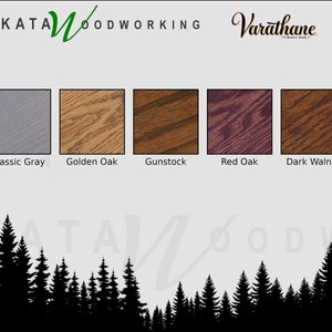 May include: Five wood stain color samples in a row, from left to right: Classic Gray, Golden Oak, Gunstock, Red Oak, Dark Walnut. The samples are labeled with their names below each one. The image is from Kata Woodworking, a company that specializes in woodworking.