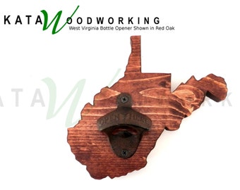 May include: A wooden bottle opener shaped like the state of West Virginia. The opener is made of red oak and has a metal bottle opener attached to it. The text "OPEN HERE" is printed on the bottle opener.
