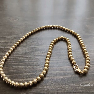 18 karat gold ball necklace over sterling silver. Gold stackable choker. Delicate necklace of small gold Vermeil beads