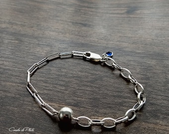 Pulsera de plata de ley con cadena de clip  y cadena rolo oval con bola 8mm y corazón de cristal Swarovski azul. Pulsera azul y plata.