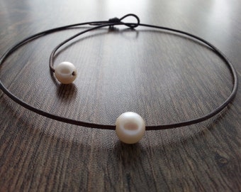 Single pearl and leather choker. Necklace, Fresh Water Pearl and Leather, A First Anniversary Stone