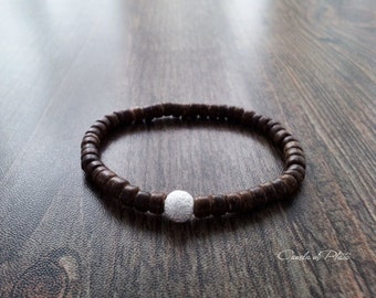 Coconut bracelet and sterling silver ball stardust. Brown coconut heishi bead and sterling silver bracelet. Stacking bracelet. Boho bracelet