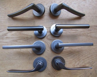 Pair Of  BLACK NICKEL Sprung internal lever on rose door handles lever latch door handles