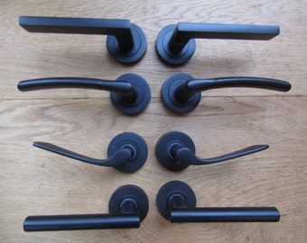 Pair Of MATT BLACK Sprung internal lever on rose door handles lever latch door handles