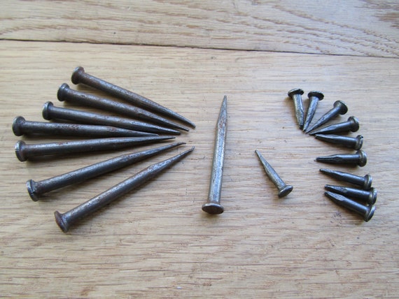 10 piece Round Rose head Hand Forged Blacksmiths Wrought Iron Nails 120 mm Long 10 piece Round Rose head Hand Forged Blacksmiths Wrought Iron Nails 120 mm Long
