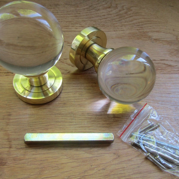 Pair of Internal traditional ROUND BALL GLASS sprung mortice lever latch door knobs interior pull handles Polished brass