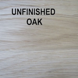 May include: Close-up of unfinished oak wood. The wood has a natural grain pattern and is light in color. The text "UNFINISHED OAK" is printed on the wood.