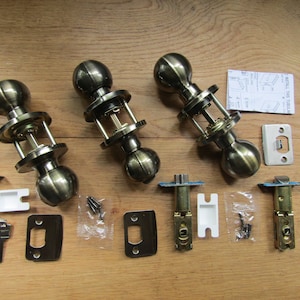 Pair of ROUND BALL antique brass sprung mortice lever latch lock  door knobs interior pull handles entrance bathroom passage