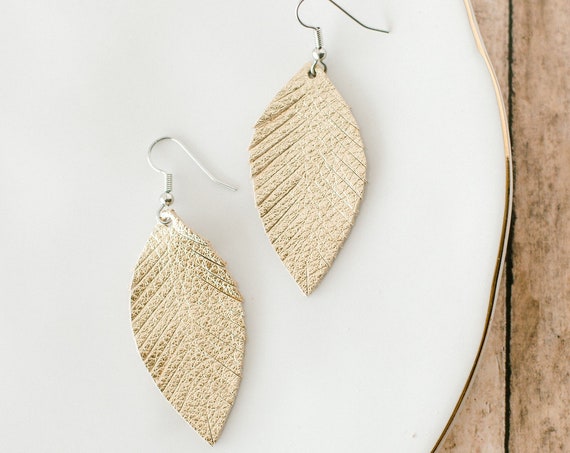 Gold feather leather earrings. Womens small gold leather earrings.