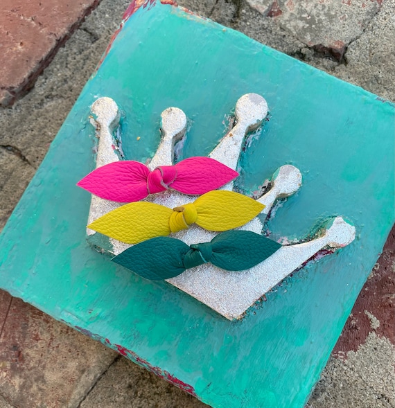 Leather know hair clips in neon pink, yellow and dark teal. Set of three