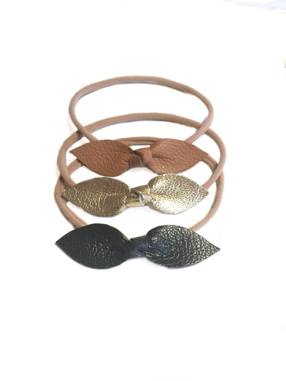 Leather baby knot leather headbands in gold, caramel and black on nylon