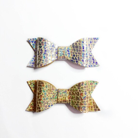 Gold or silver crackle iridescent leather hair bows.