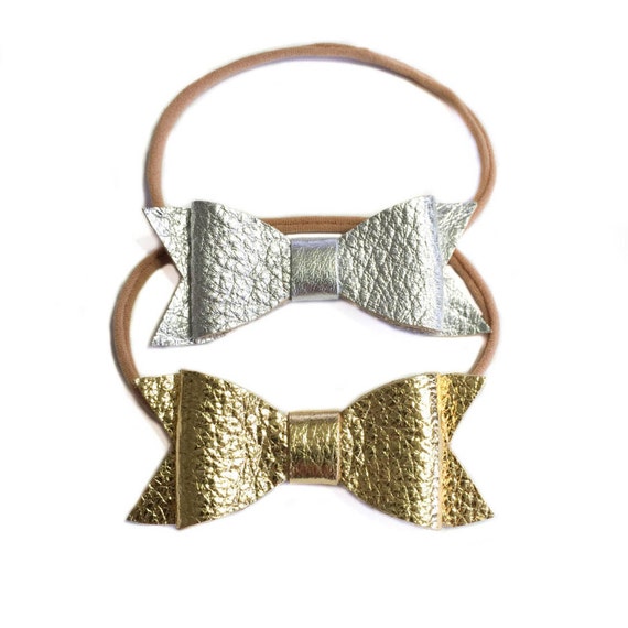 Newborn baby leather nylon headbands in silver and gold.