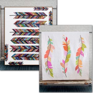 May include: Two quilts featuring feather designs. One quilt has large, colorful feathers with a white background. The other quilt has multiple arrow-shaped feathers with a white background and a wooden frame.