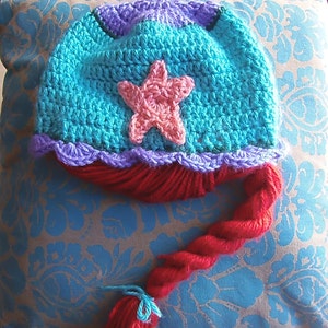 This is a disney princess Ariel, the Little Mermaid inspire, handmade crocheted hat complete with starfish and seashell trim. Made to order.